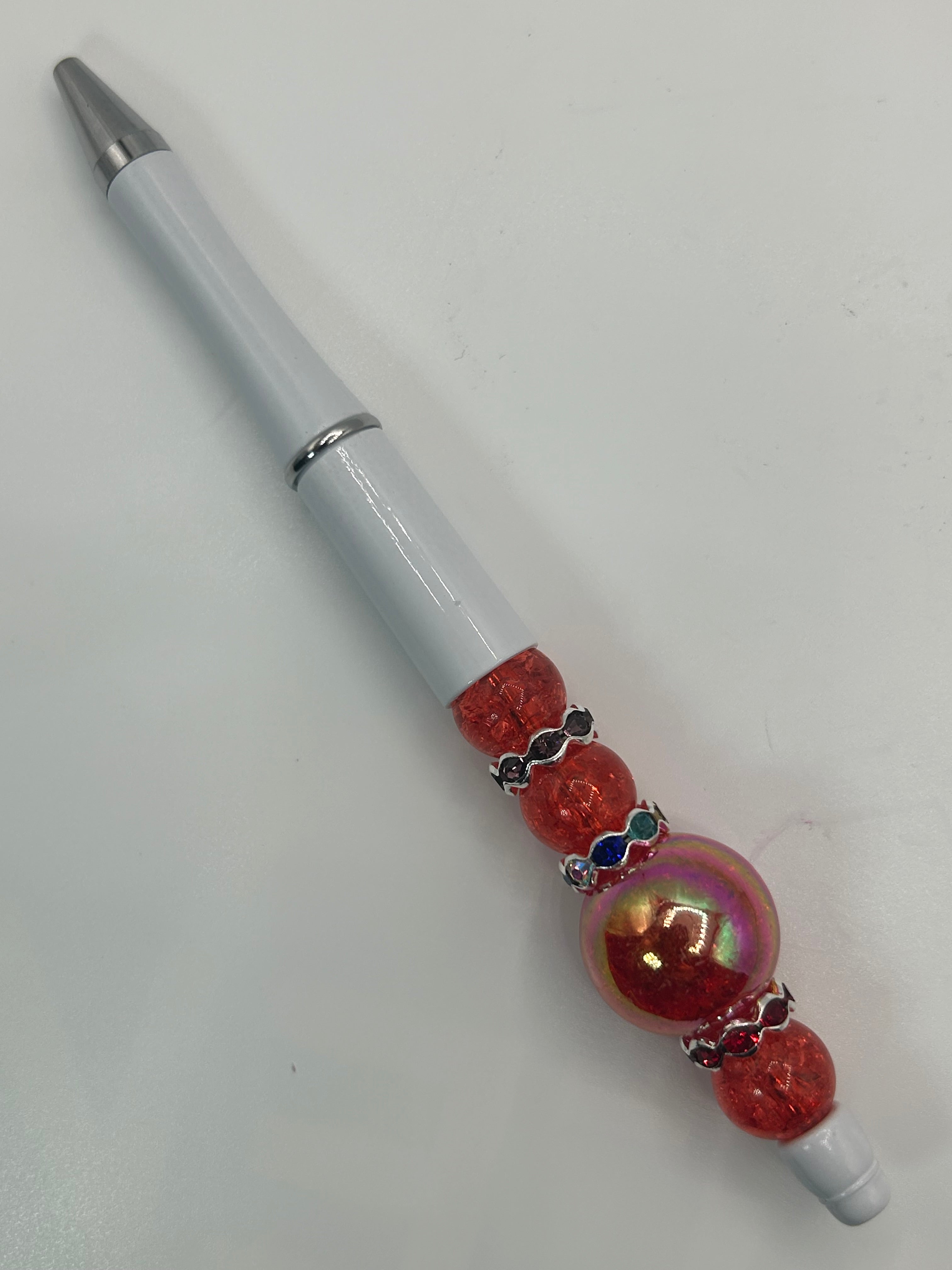 Handmade beaded pen. Comes with 2 refills.