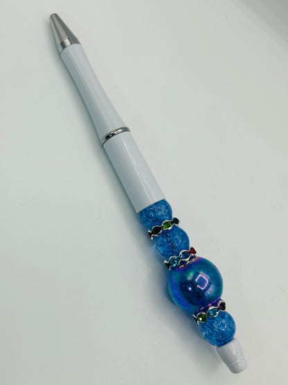 Handmade beaded pen. Comes with 2 refills.
